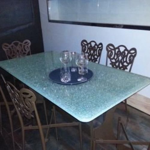 mesa de cristal laminado 6 6 6 y templado con el cristal del medio roto craquelado